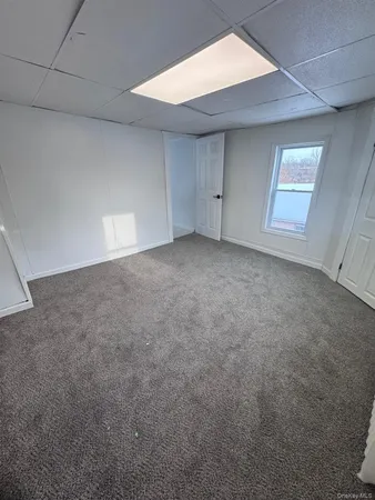 a bathroom with a toilet and a bathtub