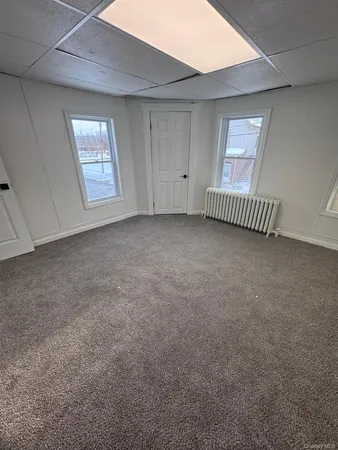 a view of a livingroom with a fireplace