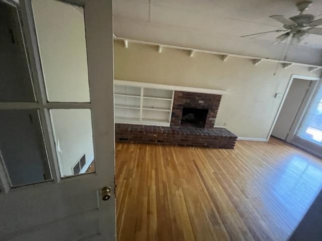 4760 Willow Road Memphis, TN 38117 - Photo 6 of 16 a view of empty room with wooden floor