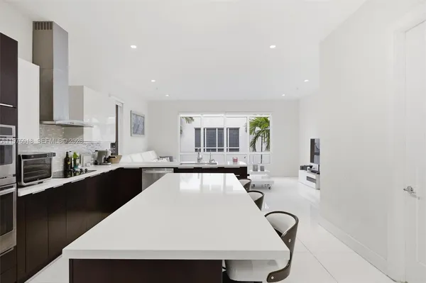 $890,000 | 6671 Northwest 105th Place, Unit 6671, Doral, FL 33178