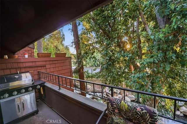 a view of a balcony with chairs