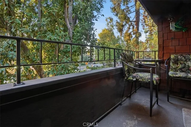 a view of yard from deck having patio
