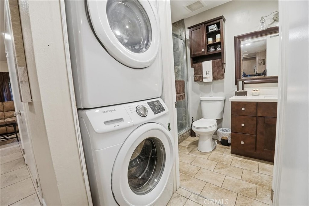 300 South Prospectors Road, Unit 29 Diamond Bar, CA 91765 - Photo 27 of 37 a view of a bathroom with washing machine and washing machine