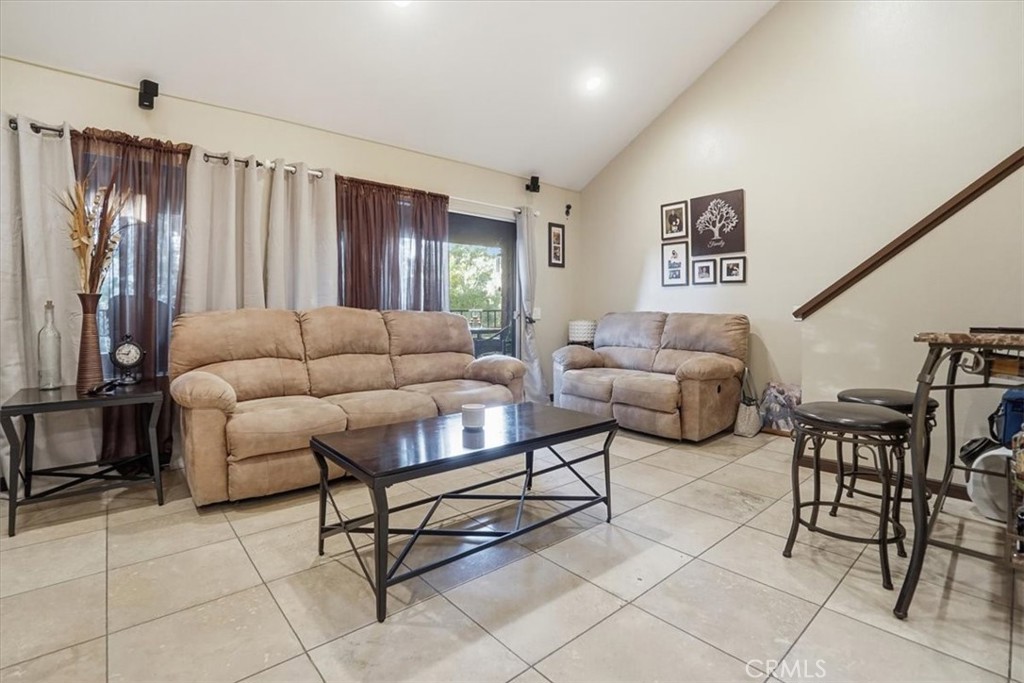 300 South Prospectors Road, Unit 29 Diamond Bar, CA 91765 - Photo 7 of 37 a living room with furniture and a window