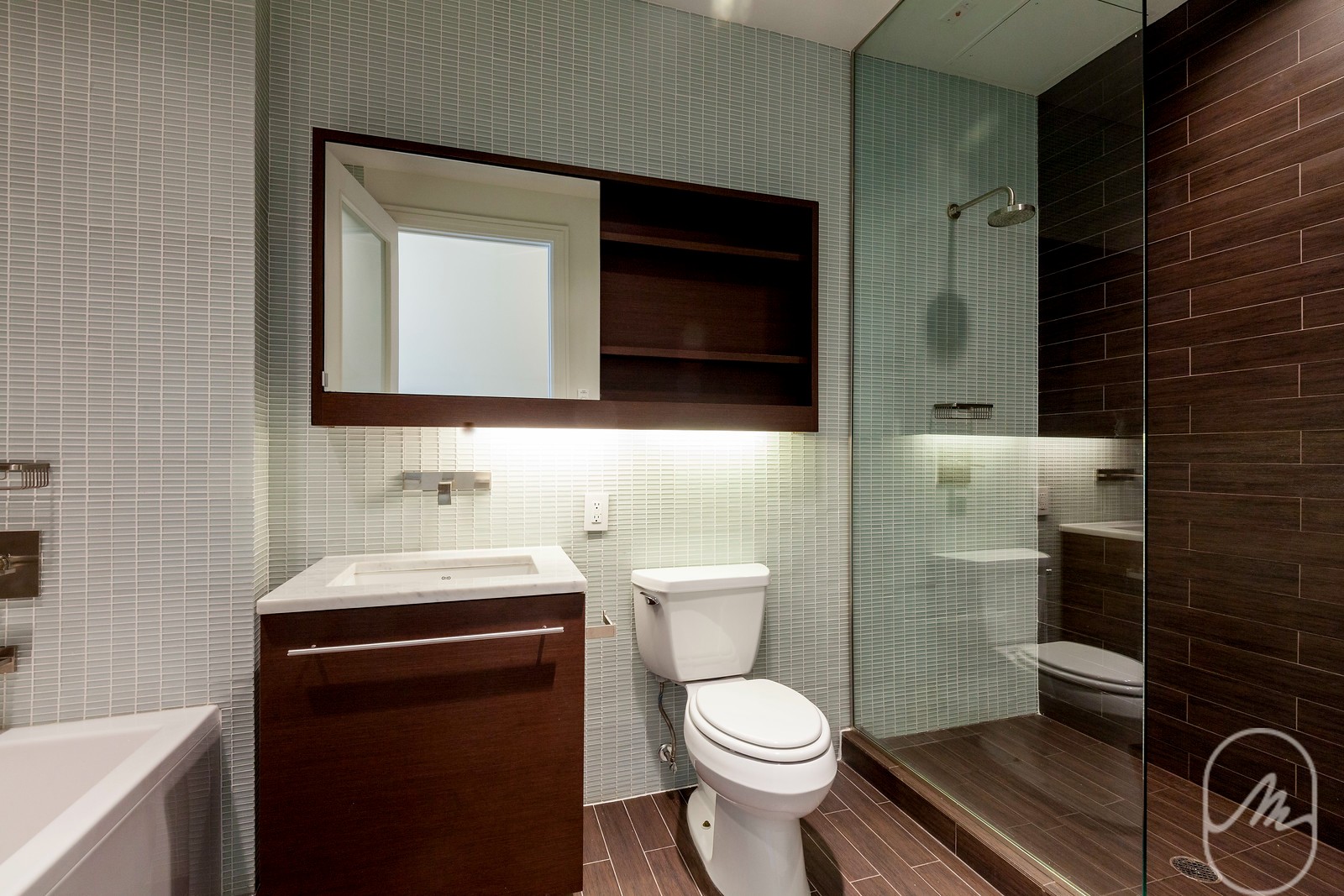 2 Water Street, Unit PHC Manhattan, NY 10004 - Photo 5 of 20 a bathroom with a toilet a sink and mirror