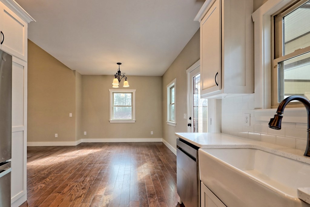 73 Cricket Lane Warne, NC 28909 - Photo 16 of 82 a kitchen with a sink cabinets and wooden floor