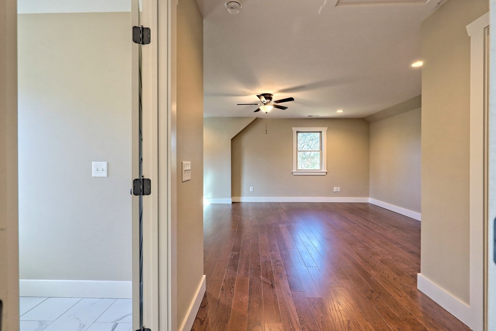 73 Cricket Lane Warne, NC 28909 - Photo 50 of 82 a view of an empty room with wooden floor and a window