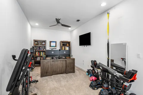 a view of a room with gym equipment