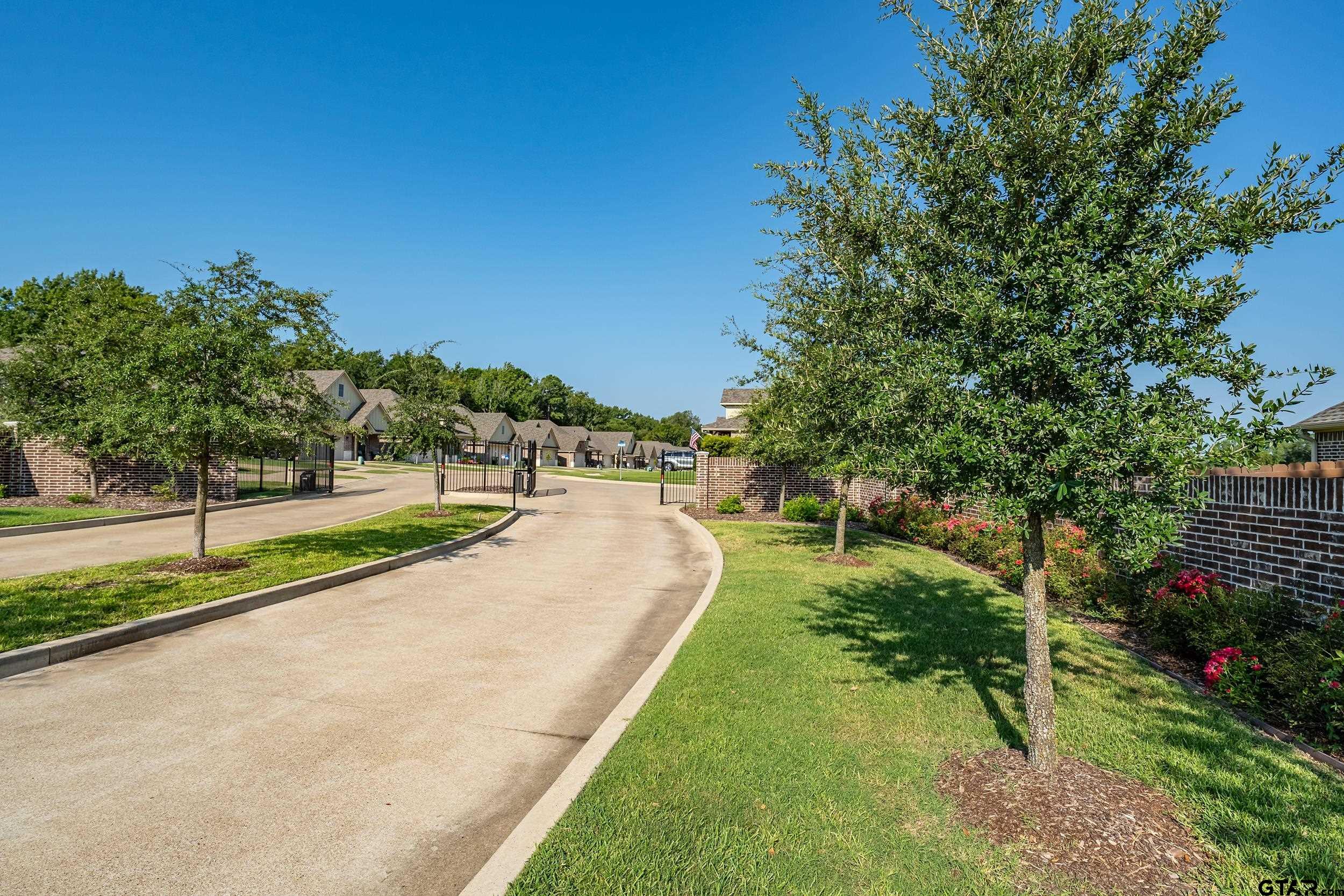 512 Preston Rdg Drive Tyler, TX 75703 - Photo 2 of 5 a view of a park with large trees