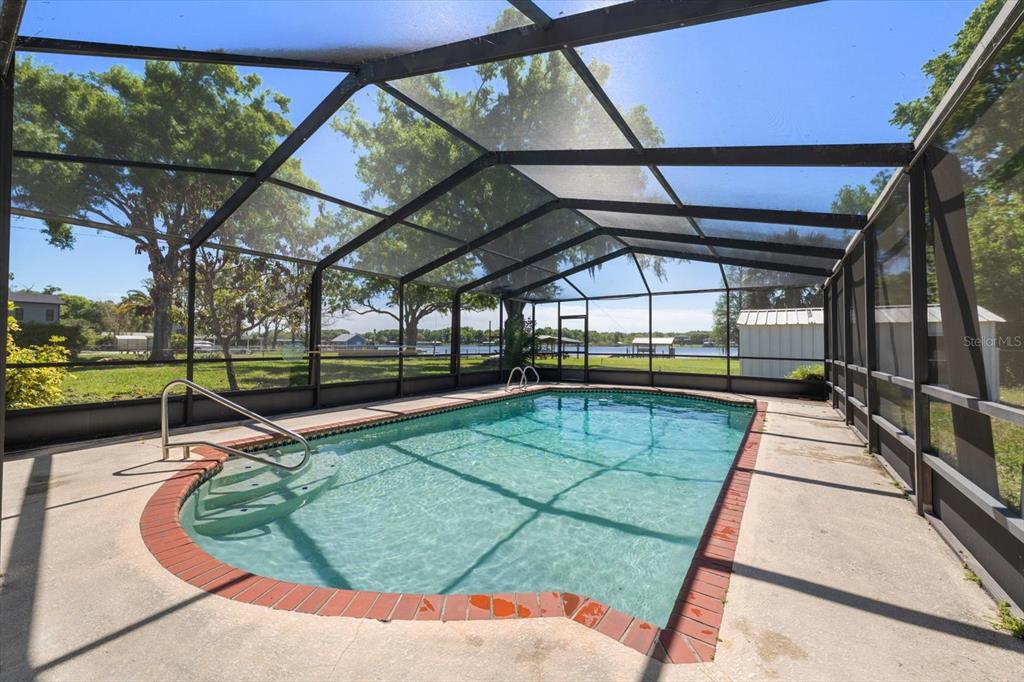 421 East County Line Road Lutz, FL 33549 - Photo 16 of 37 a view of a swimming pool