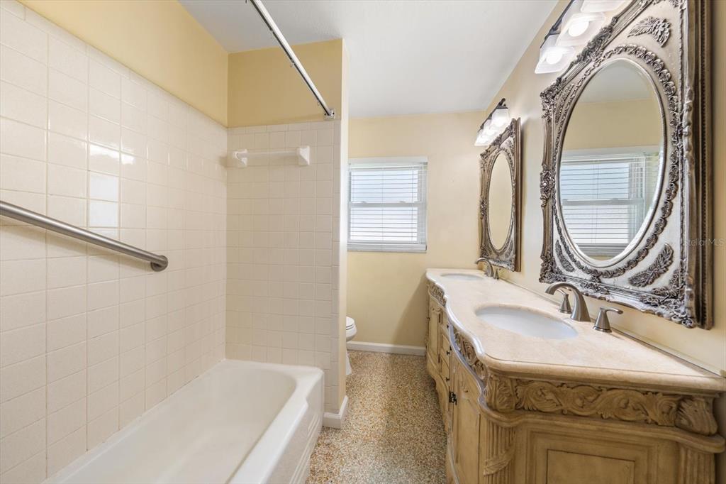 421 East County Line Road Lutz, FL 33549 - Photo 27 of 37 a bathroom with a sink a vanity and a mirror