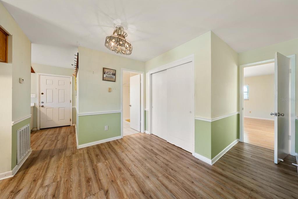 421 East County Line Road Lutz, FL 33549 - Photo 31 of 37 a view of a hallway view with wooden floor and staircase