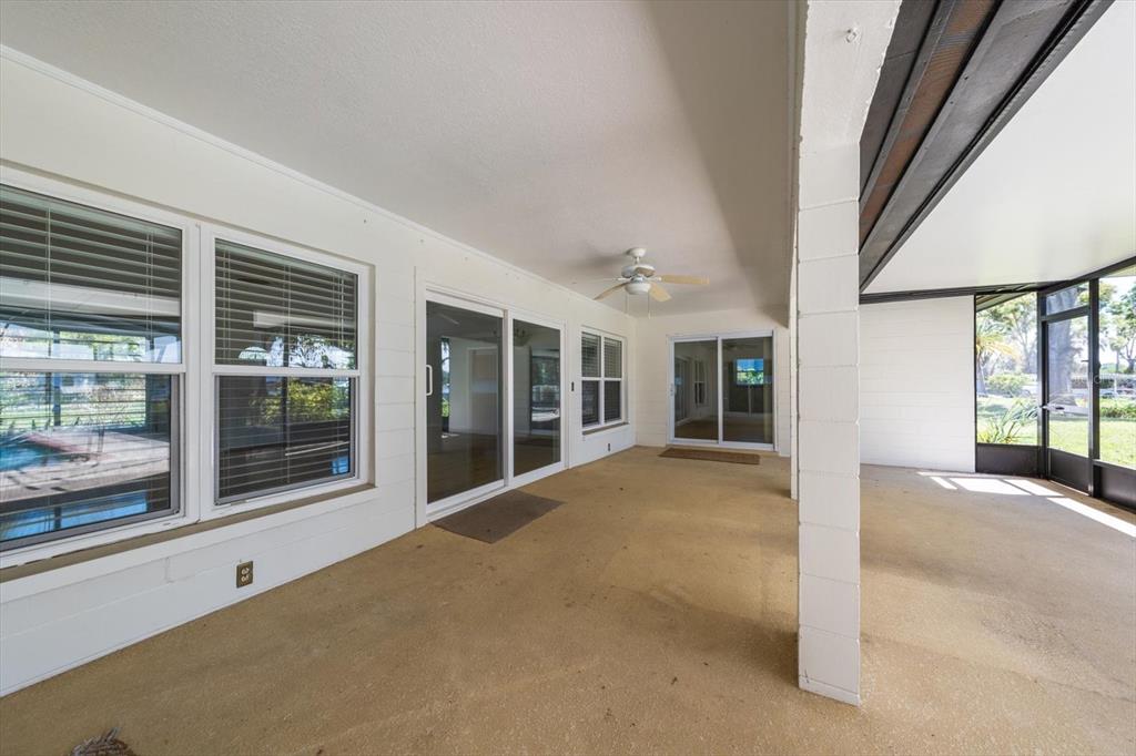 421 East County Line Road Lutz, FL 33549 - Photo 34 of 37 a view of a house with porch and windows