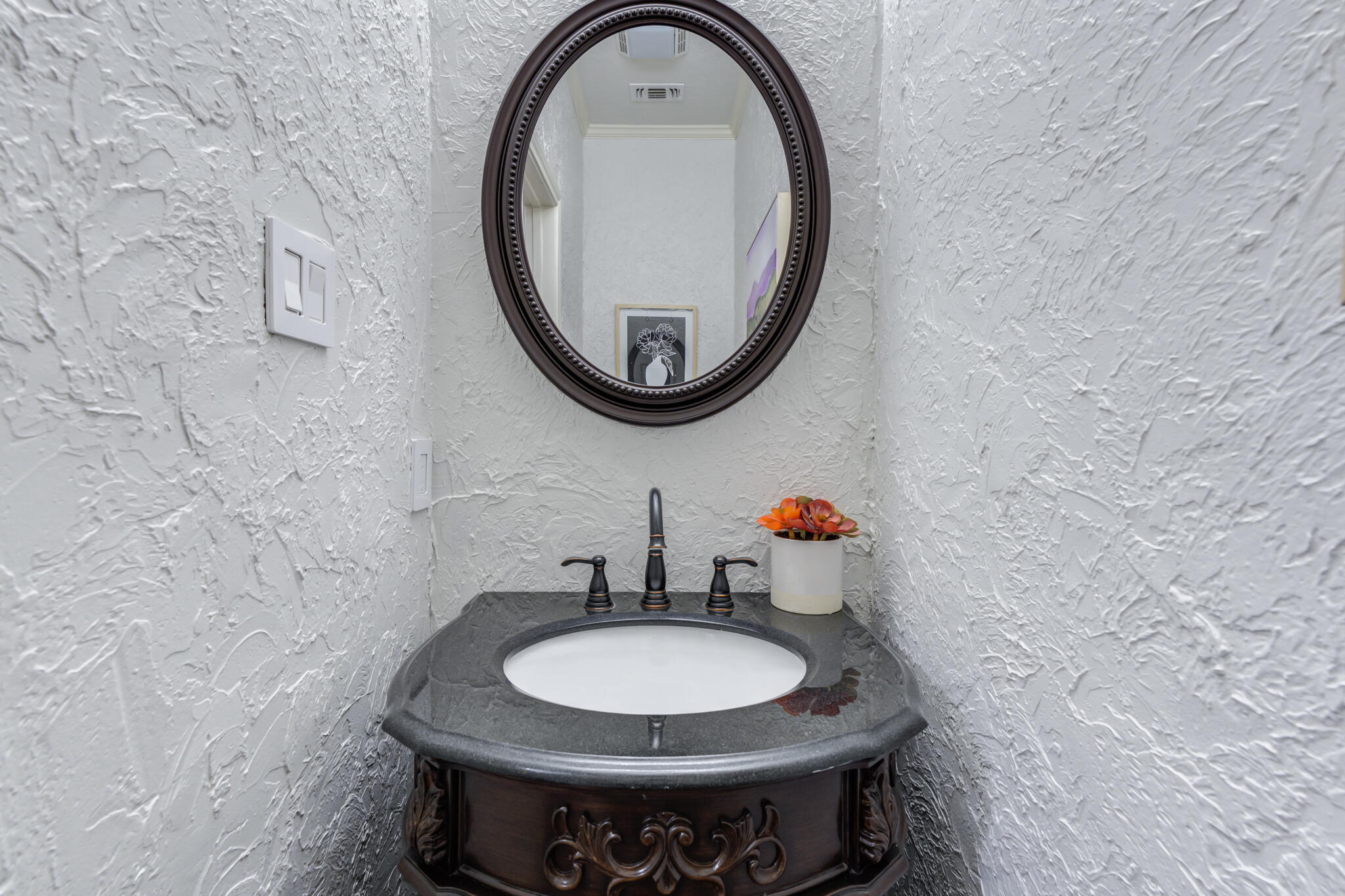 11110 Detroit Avenue Lubbock, TX 79423 - Photo 31 of 54 a bathroom with a toilet and a sink