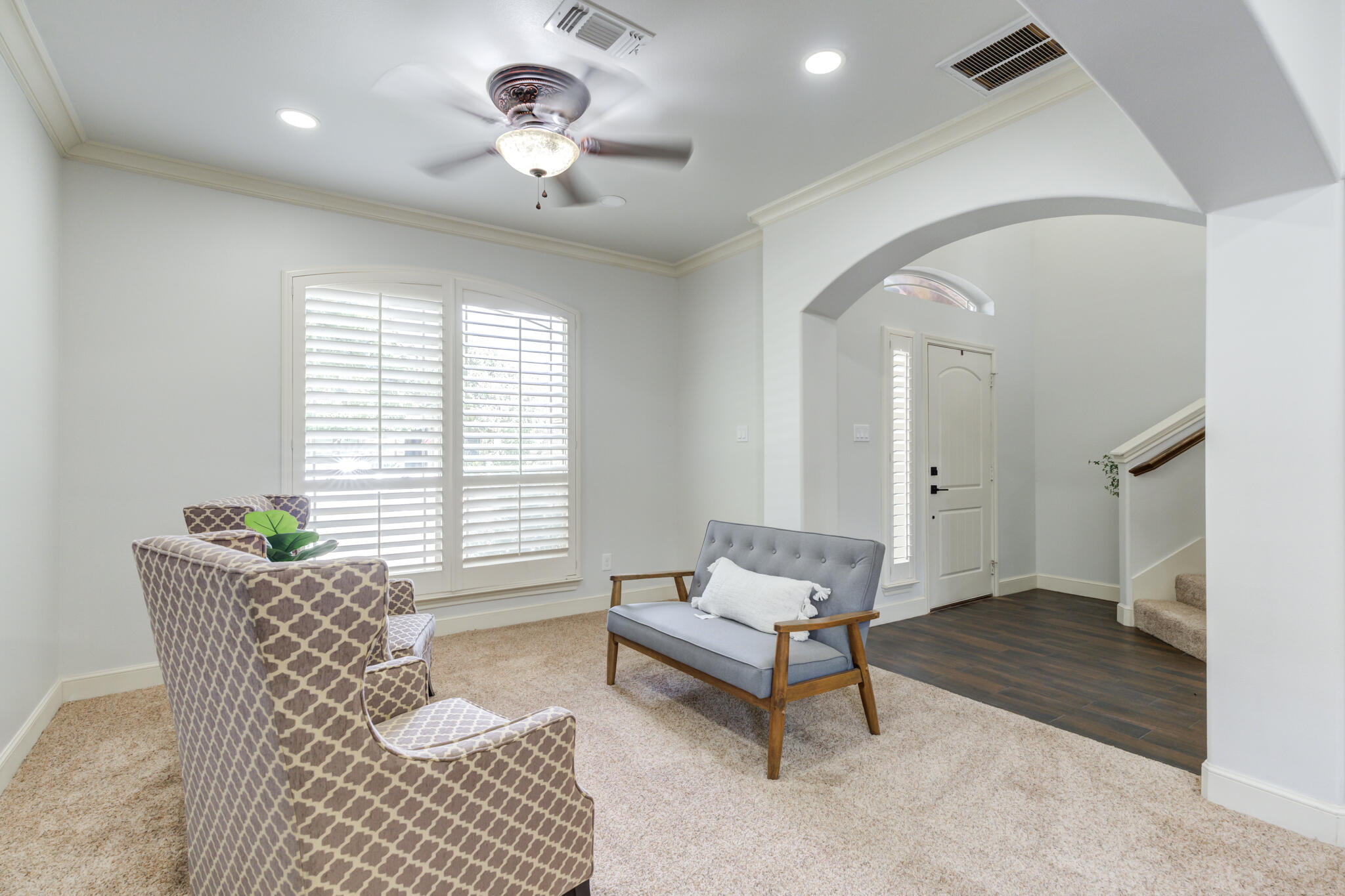 11110 Detroit Avenue Lubbock, TX 79423 - Photo 8 of 54 a living room with furniture and a chandelier