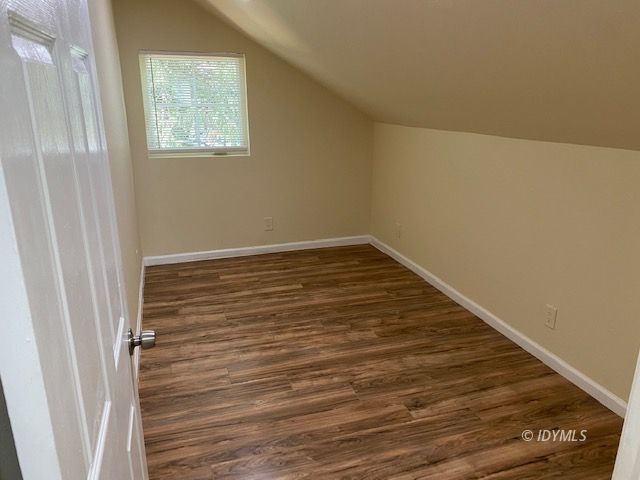 25965 Highway 243, Unit E Idyllwild, CA 92549 - Photo 11 of 17 a view of an empty room with wooden floor and a window