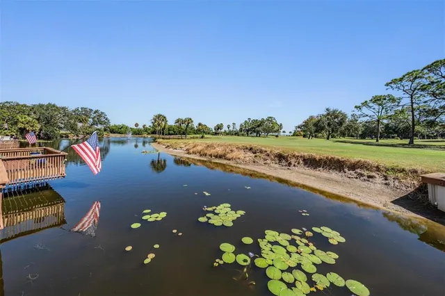 a view of a lake with outdoor space