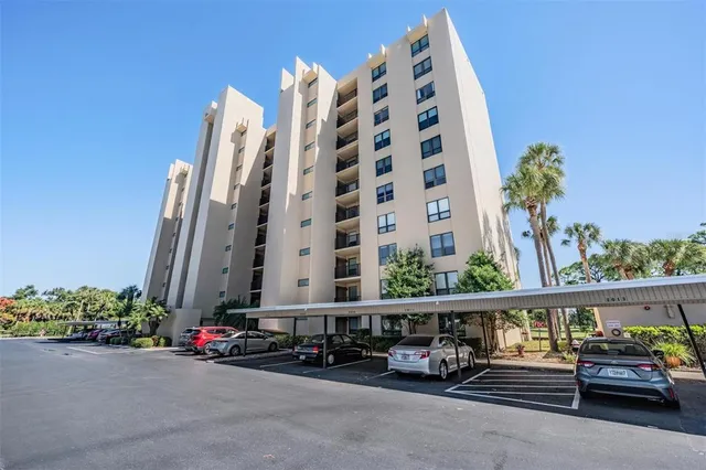front view of a building with potted plants