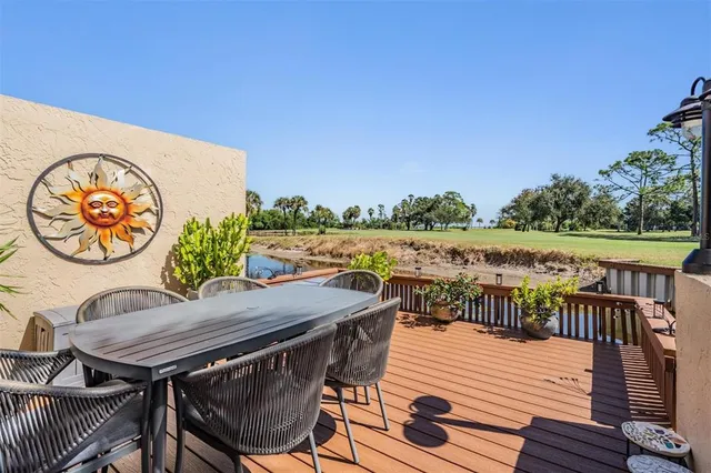 a view of a dinning tables and chairs in the patio