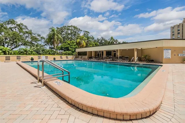 a view of a swimming pool with a terrace