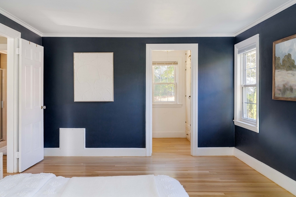 143 South Street Brookline, MA 02467 - Photo 20 of 32 a view of a livingroom with wooden floor and a cabinet