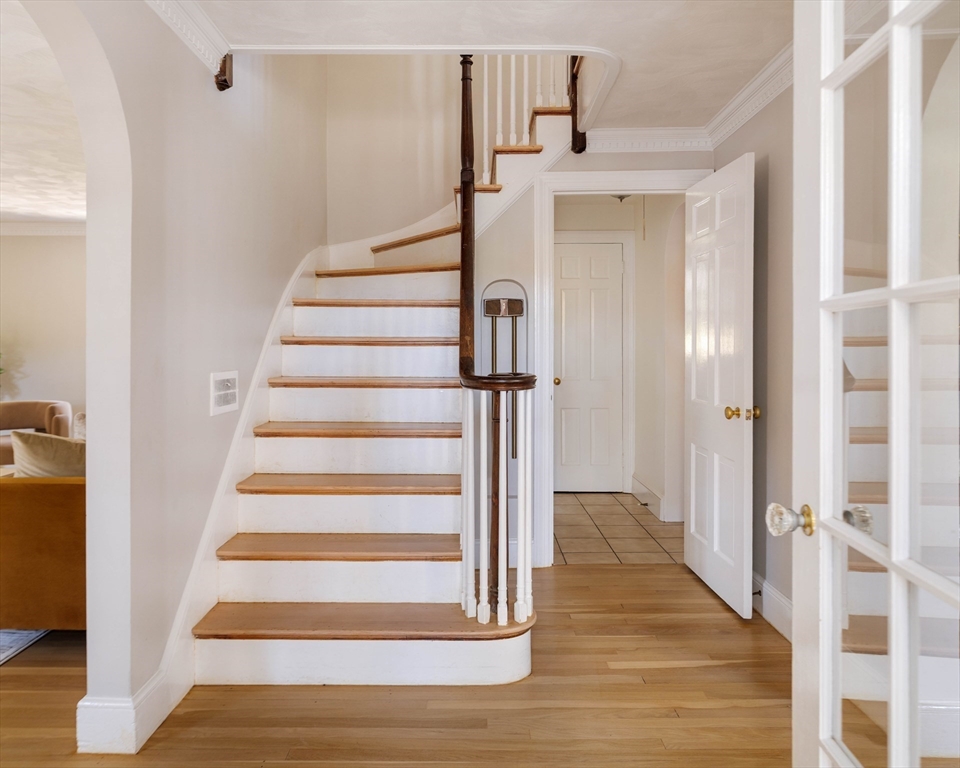 143 South Street Brookline, MA 02467 - Photo 6 of 32 a view of an entryway with staircase