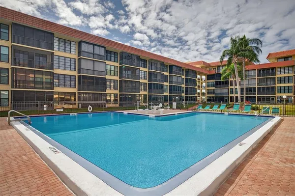 a view of a swimming pool from a terrace