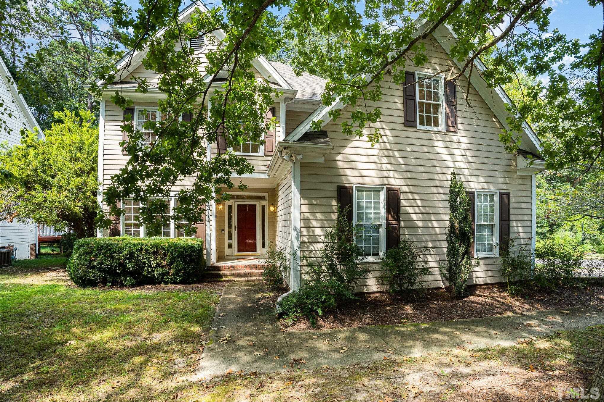 1311 Oak Crest Drive Knightdale, NC 27545 - Photo 1 of 49 front view of a house with a yard