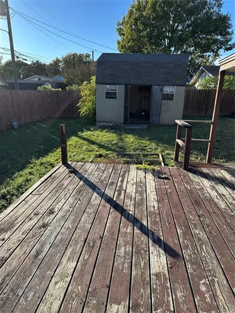 a view of backyard with wooden floor