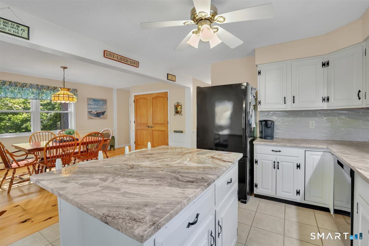 New granite countertops and tiled back splash