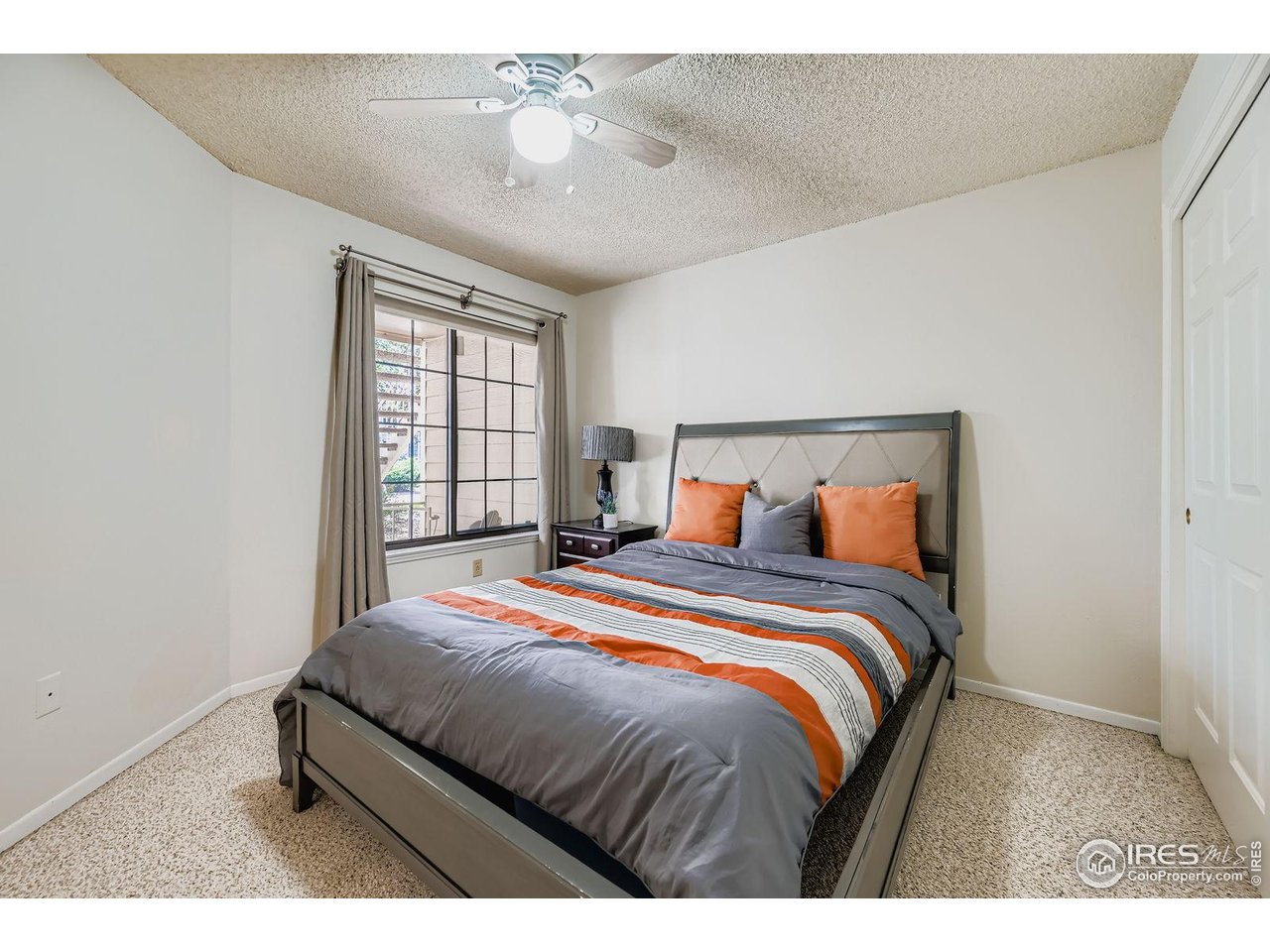 4767 White Rock Circle, Unit D Boulder, CO 80301 - Photo 20 of 41 a bedroom with a bed and window