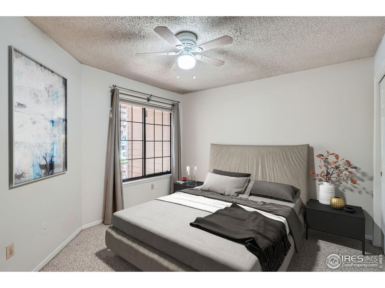 4767 White Rock Circle, Unit D Boulder, CO 80301 - Photo 22 of 41 a bedroom with a bed and window