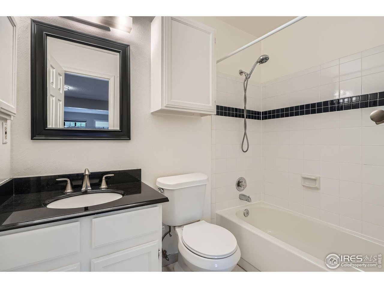 4767 White Rock Circle, Unit D Boulder, CO 80301 - Photo 28 of 41 a bathroom with a sink a toilet and bathtub
