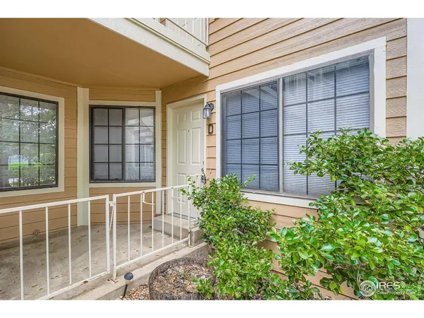 a view of front door and yard