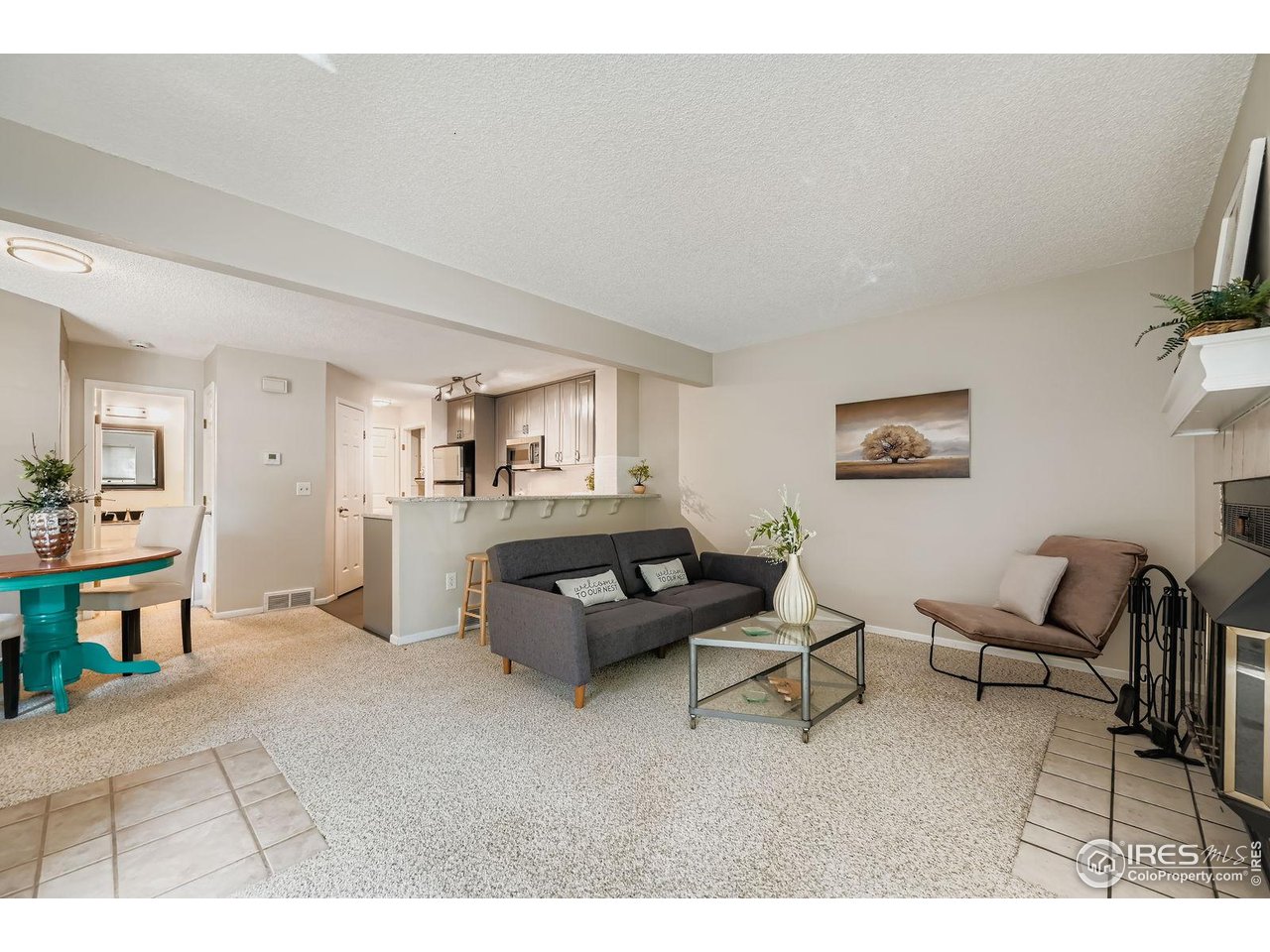 4767 White Rock Circle, Unit D Boulder, CO 80301 - Photo 5 of 41 a living room with furniture and a flat screen tv