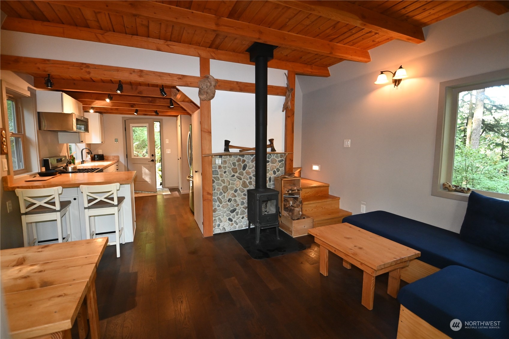 52016 South Riverside Road Gold Bar, WA 98251 - Photo 14 of 39 a living room with furniture and wooden floor