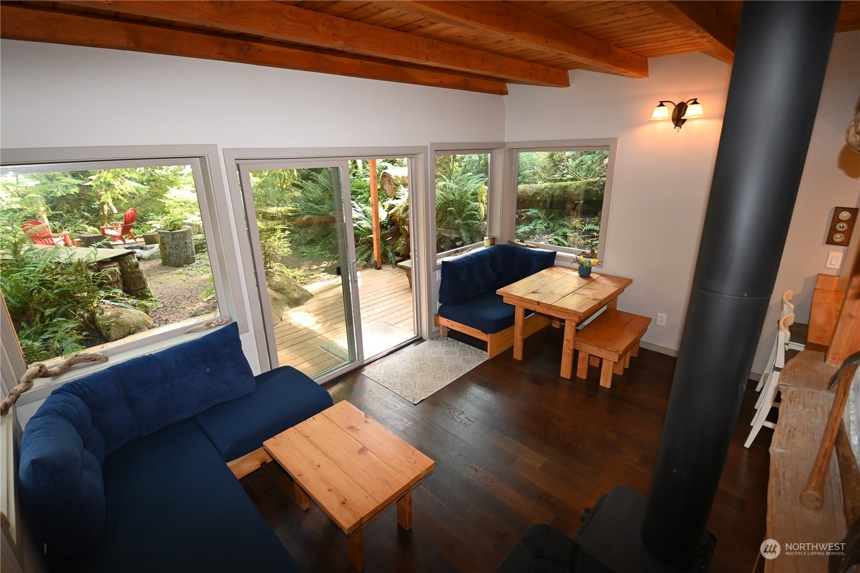 52016 South Riverside Road Gold Bar, WA 98251 - Photo 16 of 39 a living room with large window and a table