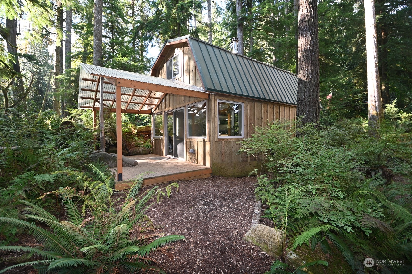 52016 South Riverside Road Gold Bar, WA 98251 - Photo 38 of 39 a view of a house with a yard balcony and garden