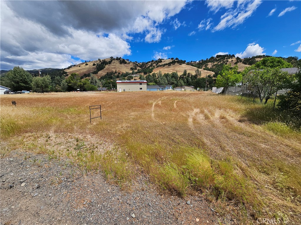 3144 Spring Valley Road Clearlake Oaks, CA 95423 - Photo 2 of 9 a view of lake with mountain
