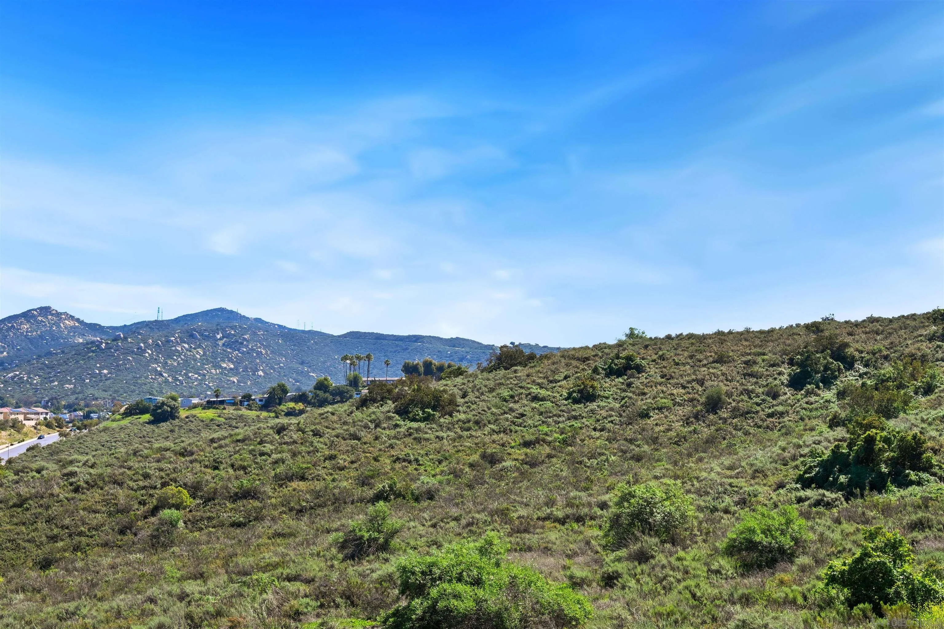 12437 Ridgeton Drive Lakeside, CA 92040 - Photo 32 of 32 a view of a mountain in the distance in a field
