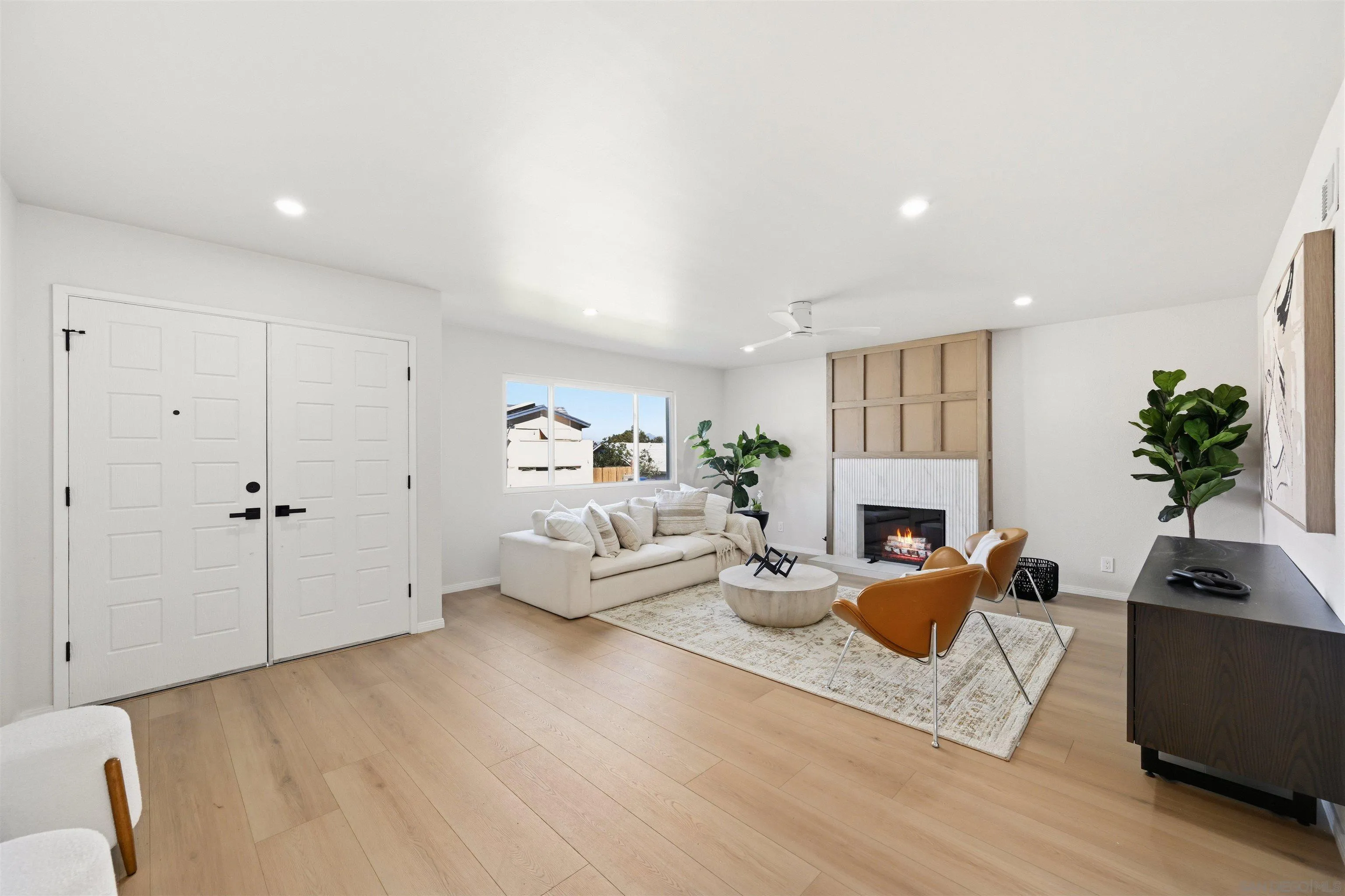 12437 Ridgeton Drive Lakeside, CA 92040 - Photo 6 of 32 a living room with furniture fireplace and potted plant
