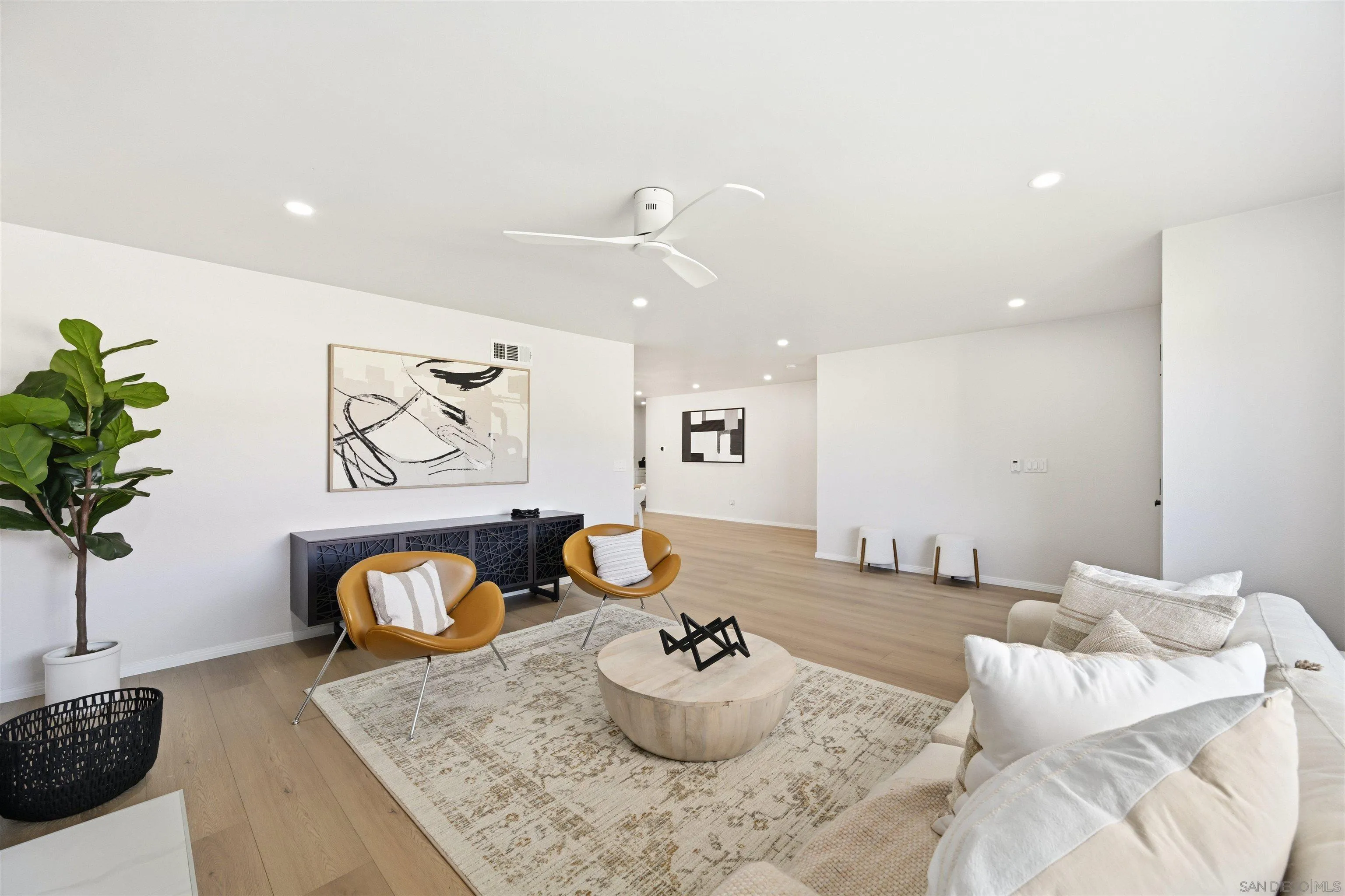 12437 Ridgeton Drive Lakeside, CA 92040 - Photo 8 of 32 a living room with furniture and potted plant