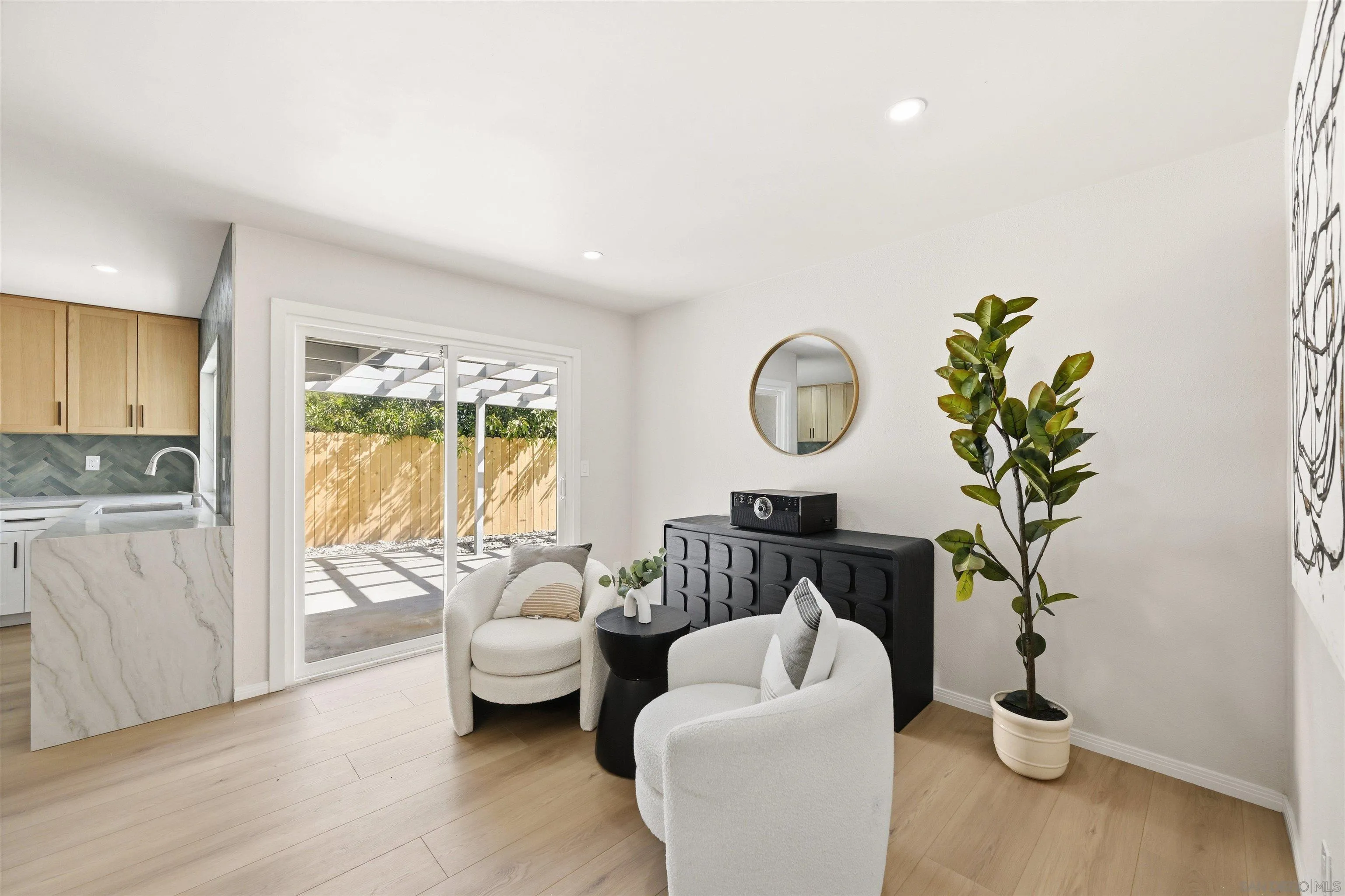 12437 Ridgeton Drive Lakeside, CA 92040 - Photo 10 of 32 a living room with furniture and a potted plant