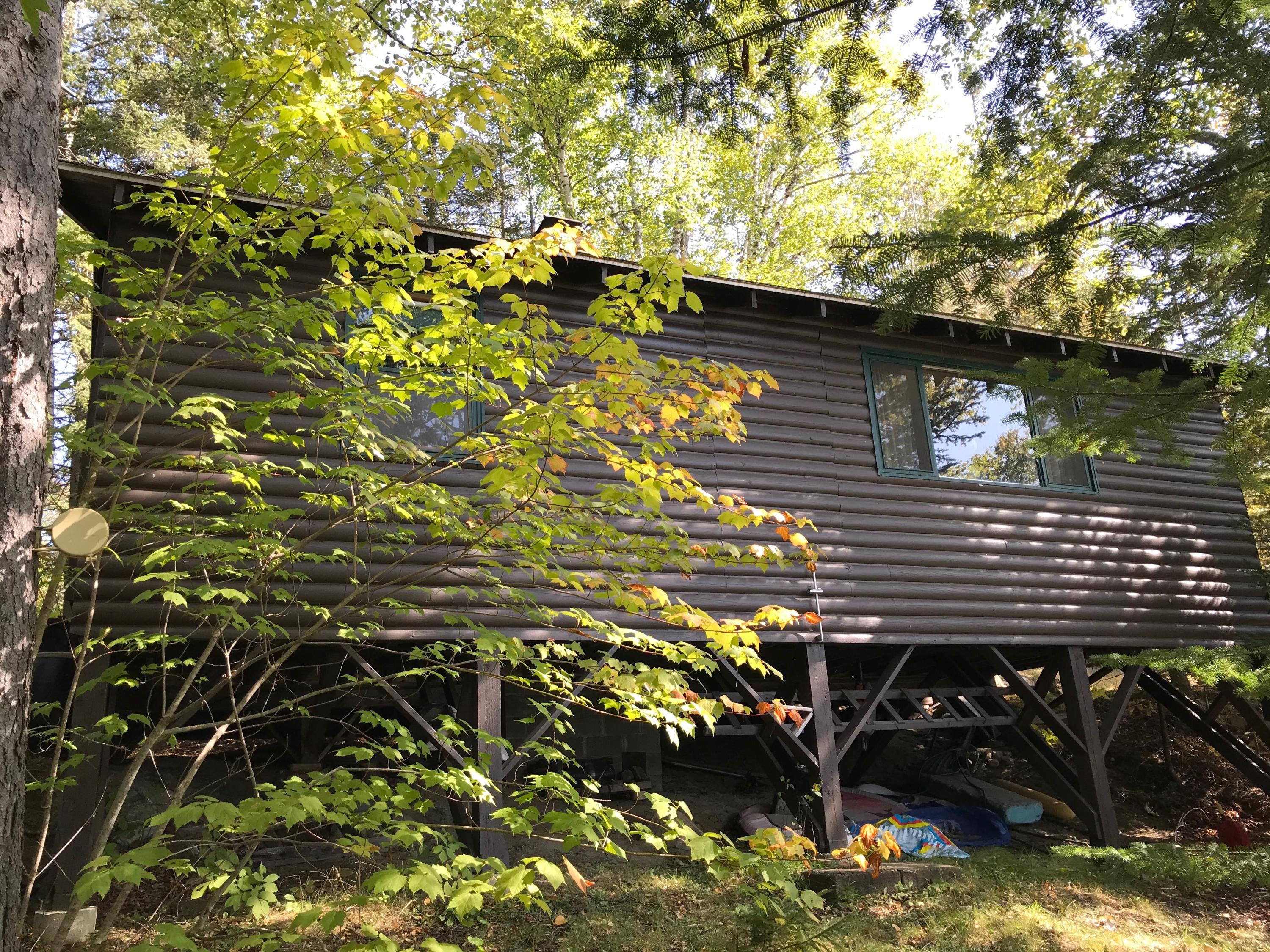 1279 Bemis Road Oquossoc, ME 04964 - Photo 11 of 22 Side of house