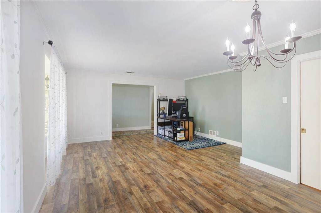 1418 Blanton Place Sherman, TX 75092 - Photo 3 of 33 a view of a room with wooden floor
