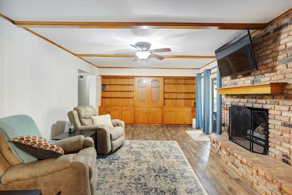1418 Blanton Place Sherman, TX 75092 - Photo 7 of 33 a living room with furniture and a fireplace
