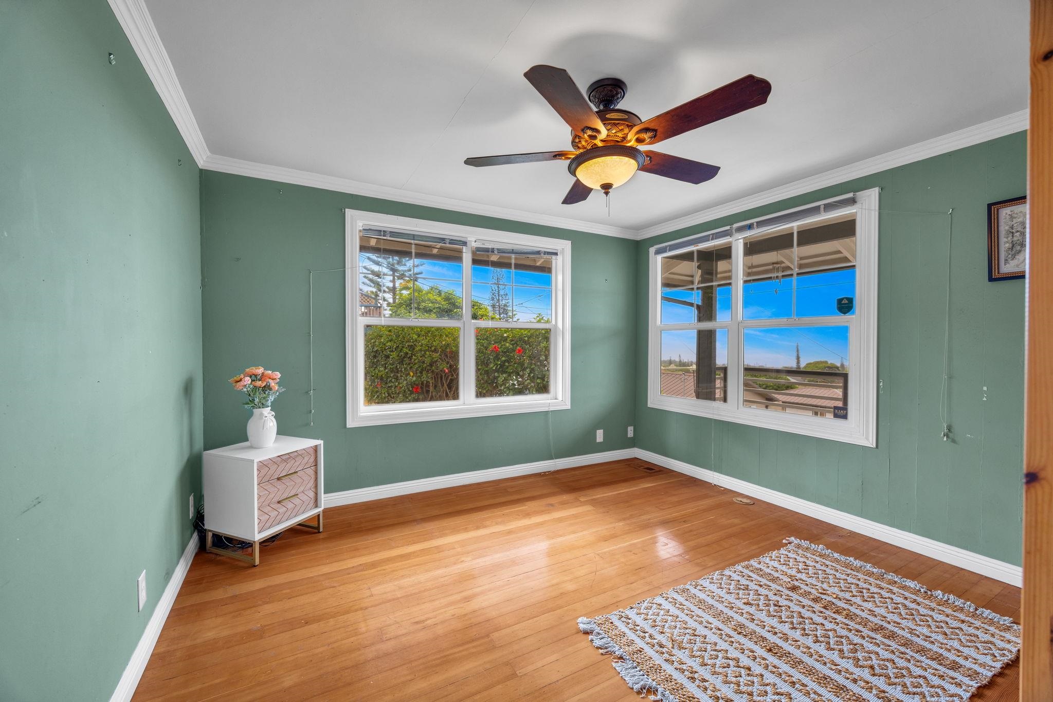 1123 Kehau Place Makawao, HI 96768 - Photo 19 of 50 a view of a livingroom with a ceiling fan and window