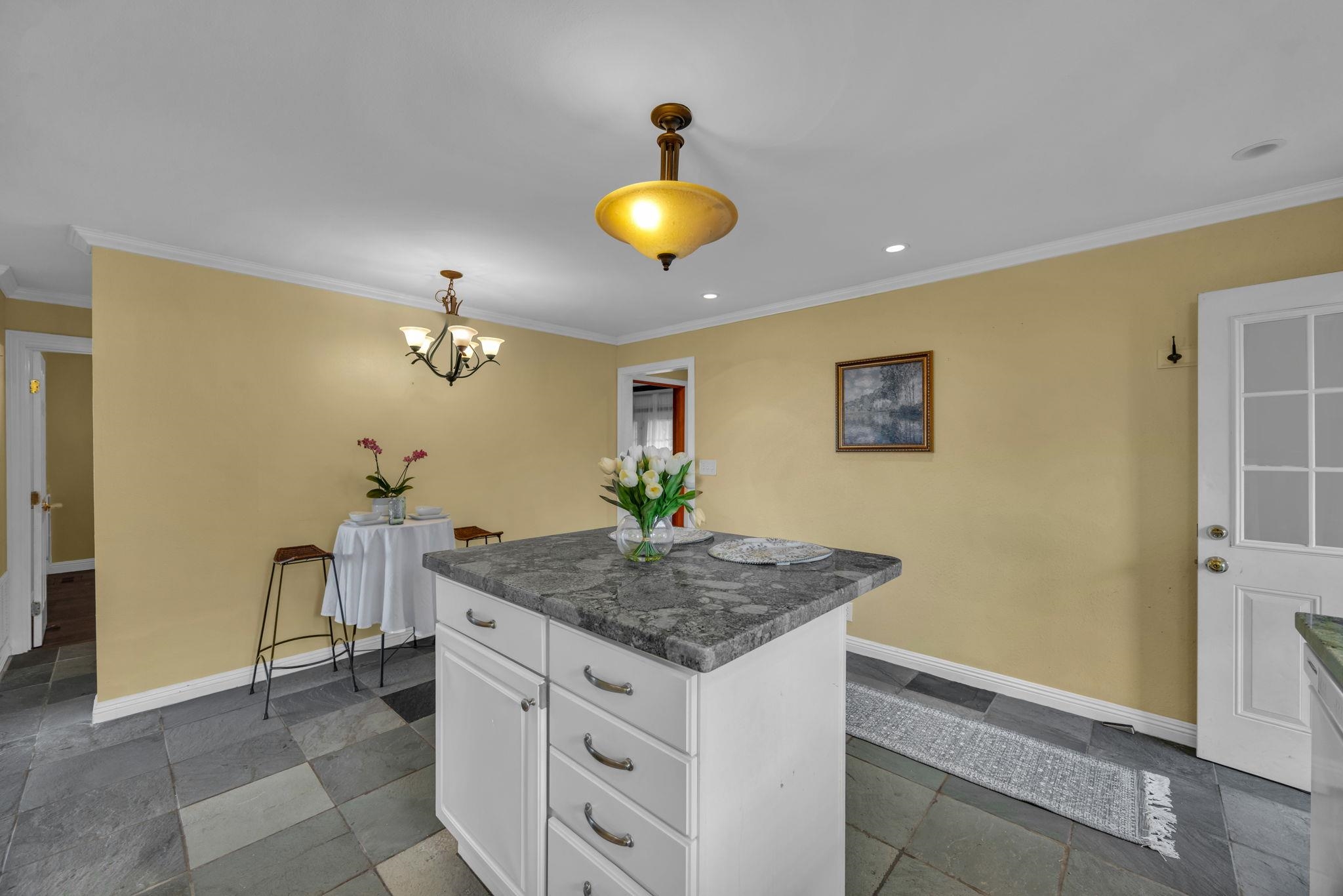 1123 Kehau Place Makawao, HI 96768 - Photo 24 of 50 a kitchen with a table and chairs