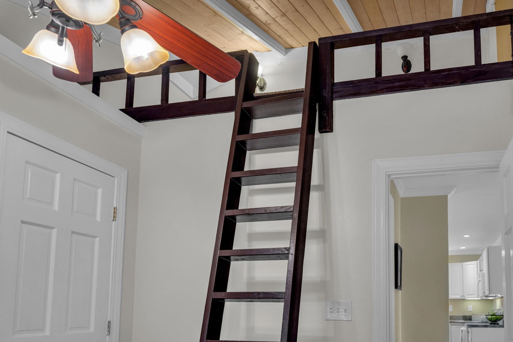 1123 Kehau Place Makawao, HI 96768 - Photo 42 of 50 a view of staircase with white walls and a window