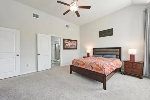 a bedroom with a bed and closet